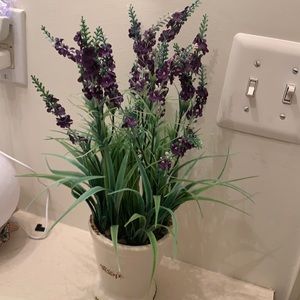 Faux lavender plant in ceramic vase